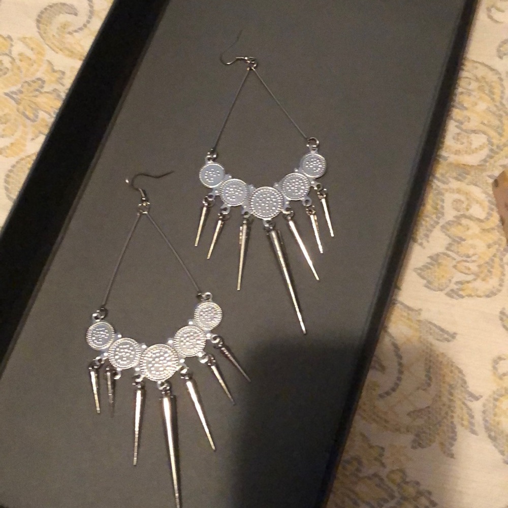Super cool silver pierced earrings Brand New!!